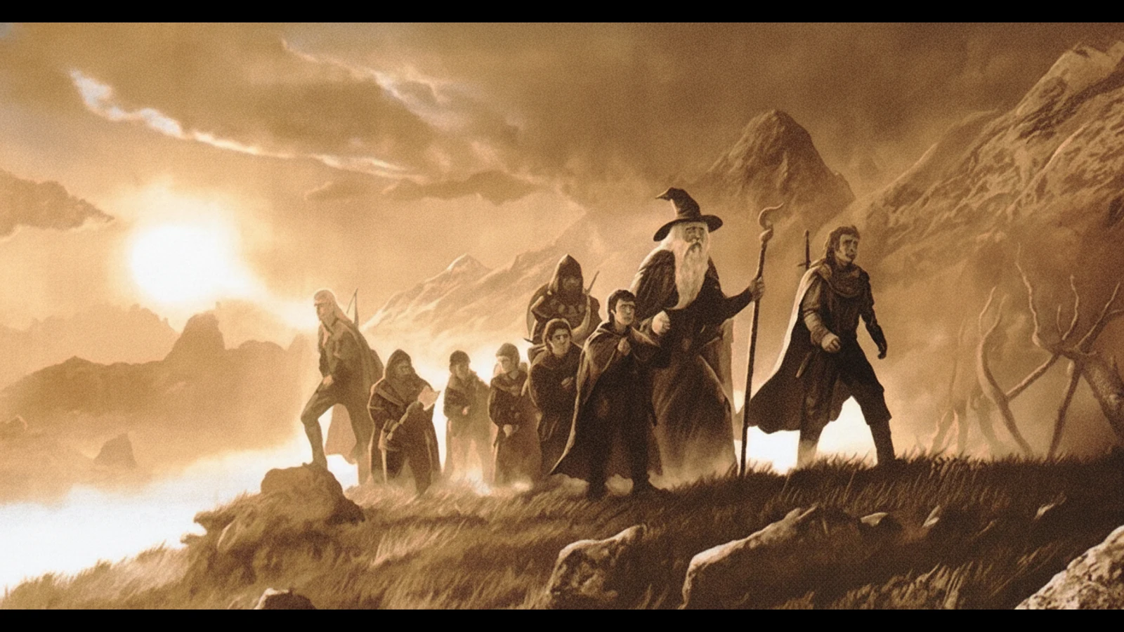 The Nine Walkers quest art: the Fellowship sets out across a ridge at dawn.